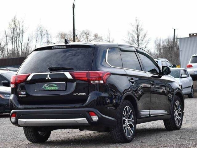 Чорний Міцубісі Аутлендер, об'ємом двигуна 2.4 л та пробігом 154 тис. км за 13499 $, фото 1 на Automoto.ua