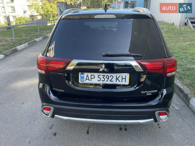 Чорний Міцубісі Аутлендер, об'ємом двигуна 2.36 л та пробігом 150 тис. км за 13500 $, фото 3 на Automoto.ua
