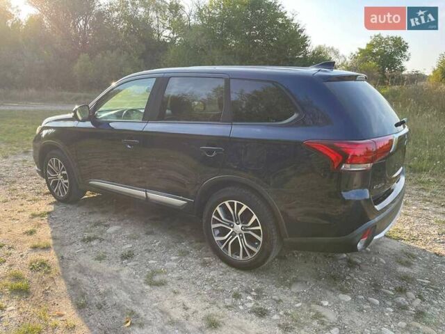 Черный Мицубиси Аутлендер, объемом двигателя 2.4 л и пробегом 221 тыс. км за 11900 $, фото 6 на Automoto.ua