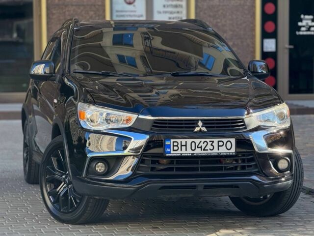 Черный Мицубиси Аутлендер, объемом двигателя 2.4 л и пробегом 130 тыс. км за 13900 $, фото 2 на Automoto.ua