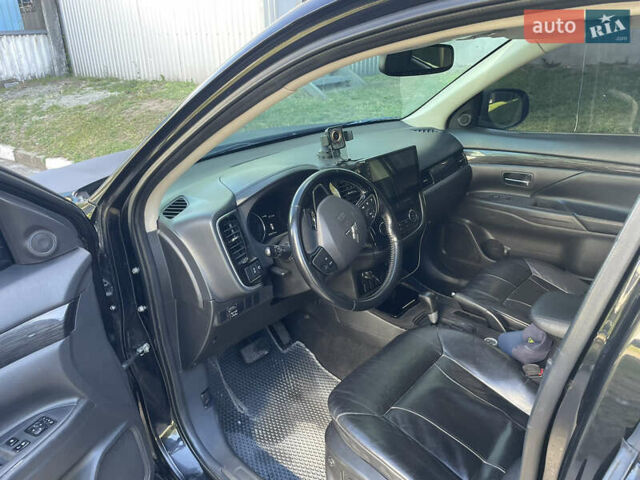 Чорний Міцубісі Аутлендер, об'ємом двигуна 2.36 л та пробігом 150 тис. км за 13500 $, фото 6 на Automoto.ua