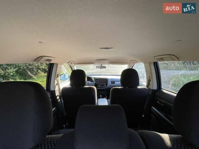 Черный Мицубиси Аутлендер, объемом двигателя 2.4 л и пробегом 221 тыс. км за 11900 $, фото 16 на Automoto.ua