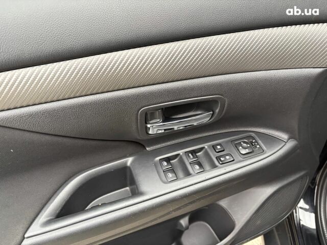 Чорний Міцубісі Аутлендер, об'ємом двигуна 2.4 л та пробігом 110 тис. км за 17290 $, фото 16 на Automoto.ua