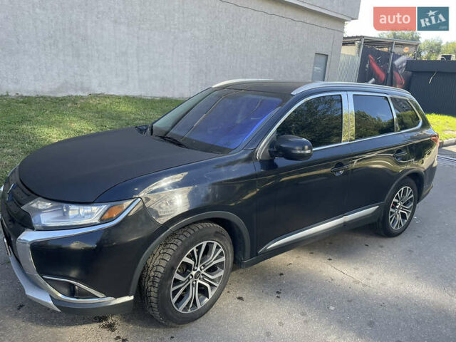 Чорний Міцубісі Аутлендер, об'ємом двигуна 2.36 л та пробігом 150 тис. км за 13500 $, фото 1 на Automoto.ua