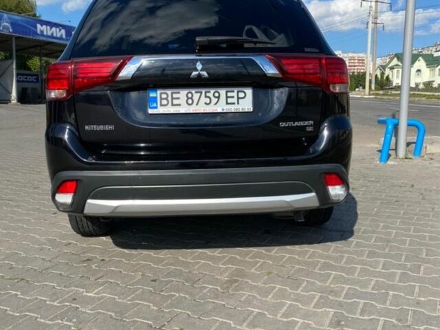 Чорний Міцубісі Аутлендер, об'ємом двигуна 2.4 л та пробігом 120 тис. км за 16000 $, фото 3 на Automoto.ua