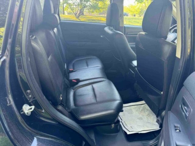 Черный Мицубиси Аутлендер, объемом двигателя 2.4 л и пробегом 66 тыс. км за 10650 $, фото 9 на Automoto.ua