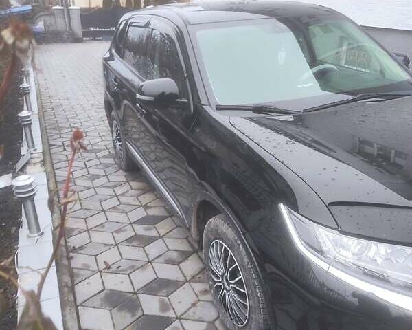 Чорний Міцубісі Аутлендер, об'ємом двигуна 2 л та пробігом 63 тис. км за 17500 $, фото 3 на Automoto.ua
