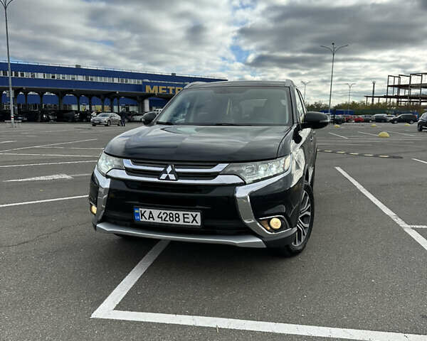 Чорний Міцубісі Аутлендер, об'ємом двигуна 2.36 л та пробігом 166 тис. км за 17100 $, фото 1 на Automoto.ua