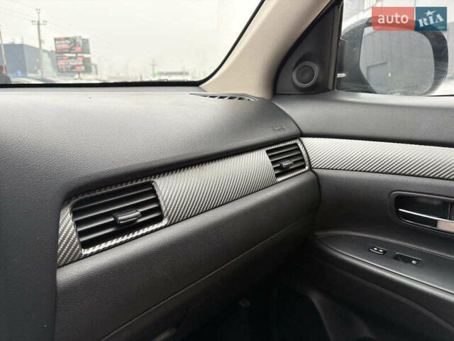 Чорний Міцубісі Аутлендер, об'ємом двигуна 2.4 л та пробігом 110 тис. км за 17290 $, фото 24 на Automoto.ua