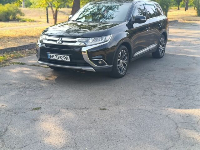 Черный Мицубиси Аутлендер, объемом двигателя 2.4 л и пробегом 156 тыс. км за 330 $, фото 3 на Automoto.ua