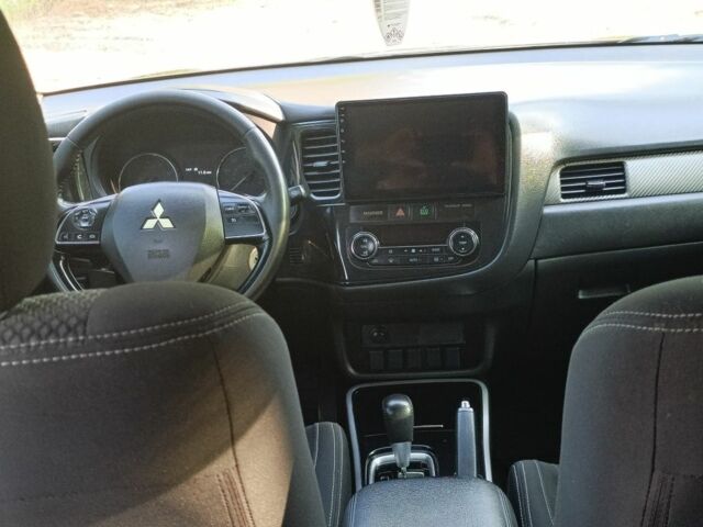 Черный Мицубиси Аутлендер, объемом двигателя 2.4 л и пробегом 156 тыс. км за 330 $, фото 18 на Automoto.ua