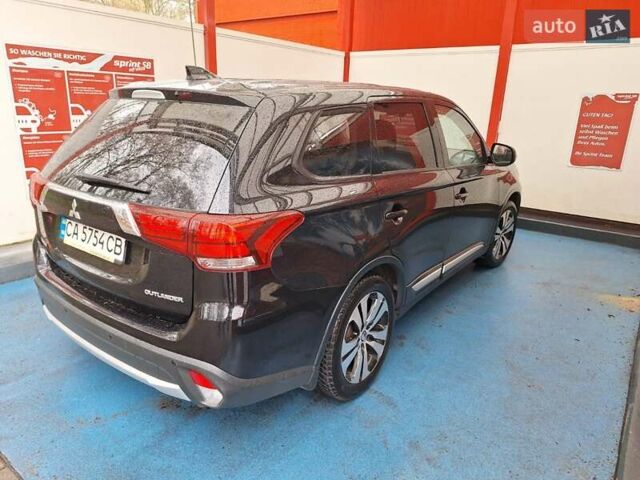 Чорний Міцубісі Аутлендер, об'ємом двигуна 2 л та пробігом 114 тис. км за 17600 $, фото 4 на Automoto.ua