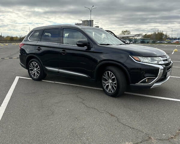 Чорний Міцубісі Аутлендер, об'ємом двигуна 2.36 л та пробігом 166 тис. км за 17100 $, фото 29 на Automoto.ua