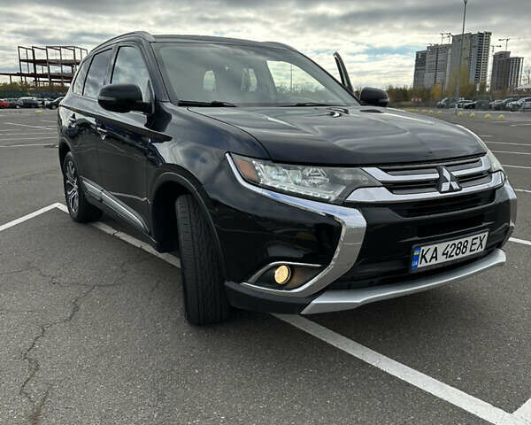 Чорний Міцубісі Аутлендер, об'ємом двигуна 2.36 л та пробігом 166 тис. км за 17100 $, фото 7 на Automoto.ua