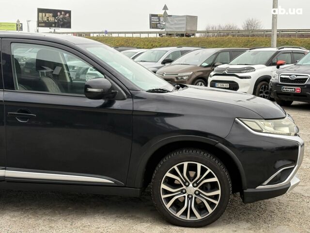 Чорний Міцубісі Аутлендер, об'ємом двигуна 2.4 л та пробігом 110 тис. км за 17290 $, фото 4 на Automoto.ua