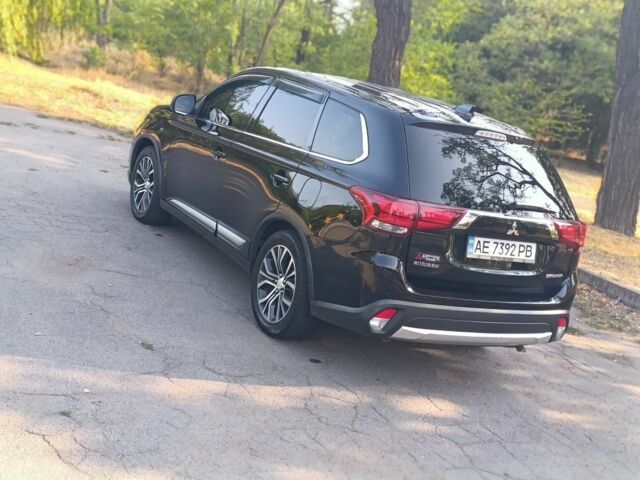 Черный Мицубиси Аутлендер, объемом двигателя 2.4 л и пробегом 156 тыс. км за 330 $, фото 8 на Automoto.ua