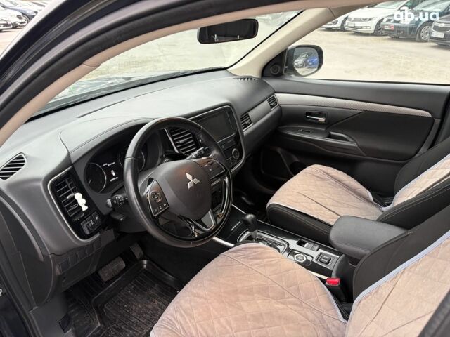 Чорний Міцубісі Аутлендер, об'ємом двигуна 2.4 л та пробігом 110 тис. км за 17290 $, фото 18 на Automoto.ua