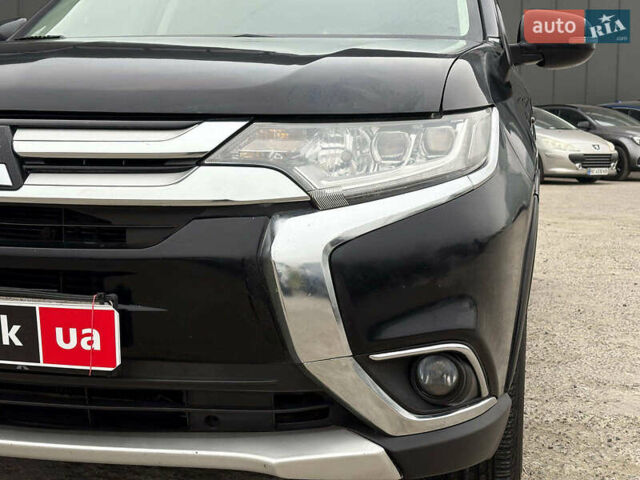 Чорний Міцубісі Аутлендер, об'ємом двигуна 2.4 л та пробігом 110 тис. км за 17290 $, фото 14 на Automoto.ua