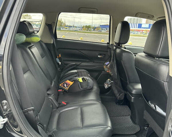 Чорний Міцубісі Аутлендер, об'ємом двигуна 2.36 л та пробігом 166 тис. км за 17100 $, фото 15 на Automoto.ua