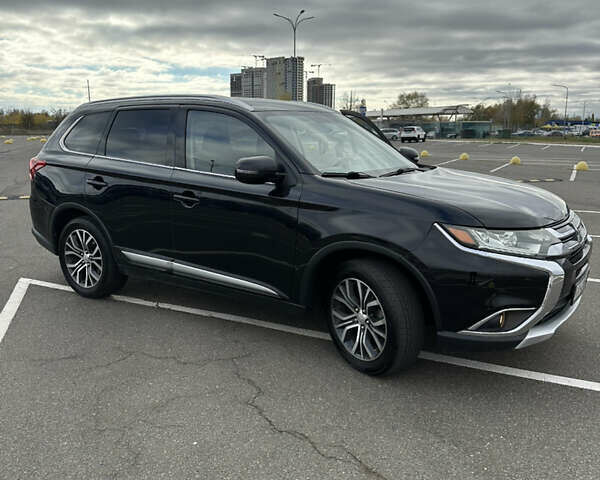 Чорний Міцубісі Аутлендер, об'ємом двигуна 2.36 л та пробігом 166 тис. км за 17100 $, фото 6 на Automoto.ua