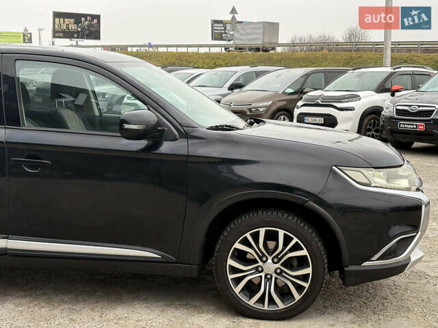 Чорний Міцубісі Аутлендер, об'ємом двигуна 2.4 л та пробігом 110 тис. км за 17290 $, фото 4 на Automoto.ua