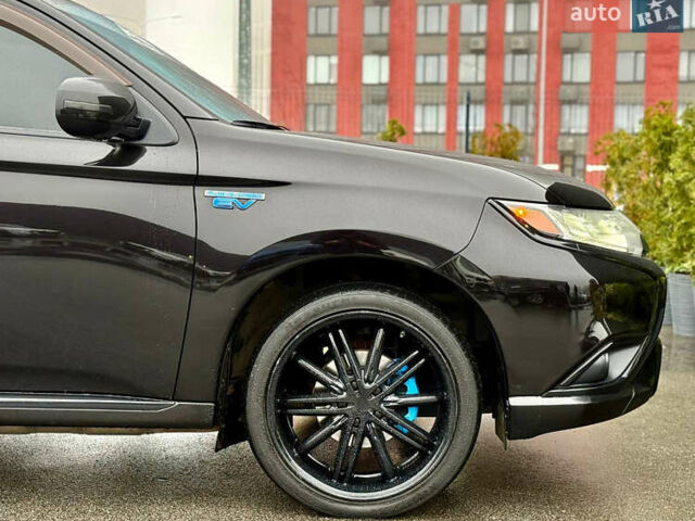 Чорний Міцубісі Аутлендер, об'ємом двигуна 2 л та пробігом 79 тис. км за 22900 $, фото 11 на Automoto.ua