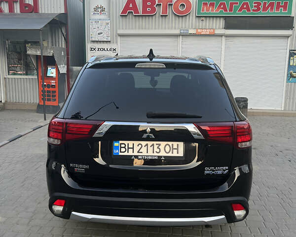Чорний Міцубісі Аутлендер, об'ємом двигуна 2 л та пробігом 155 тис. км за 22500 $, фото 22 на Automoto.ua