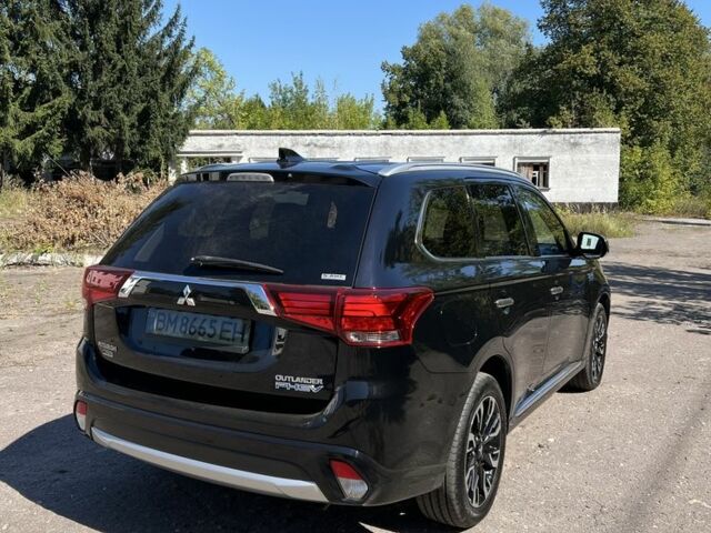 Черный Мицубиси Аутлендер, объемом двигателя 2 л и пробегом 54 тыс. км за 20800 $, фото 2 на Automoto.ua