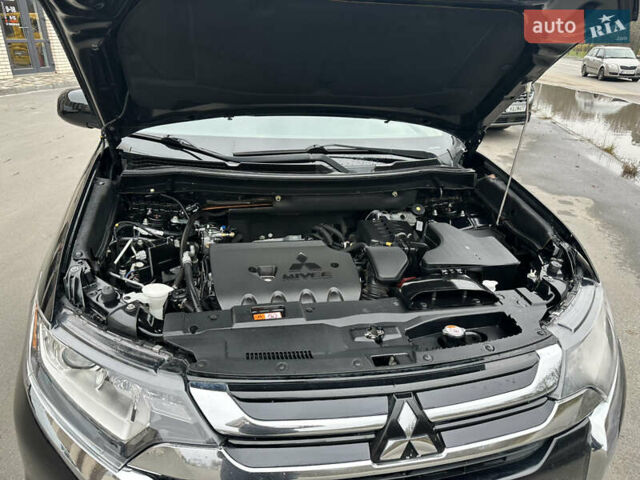 Чорний Міцубісі Аутлендер, об'ємом двигуна 2.36 л та пробігом 169 тис. км за 13450 $, фото 31 на Automoto.ua