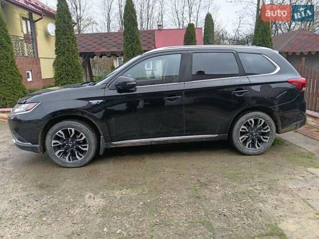Чорний Міцубісі Аутлендер, об'ємом двигуна 2 л та пробігом 96 тис. км за 22000 $, фото 4 на Automoto.ua
