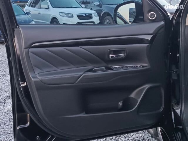 Черный Мицубиси Аутлендер, объемом двигателя 2 л и пробегом 115 тыс. км за 23700 $, фото 17 на Automoto.ua