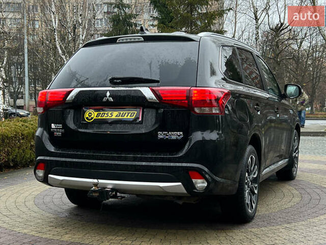 Черный Мицубиси Аутлендер, объемом двигателя 2 л и пробегом 96 тыс. км за 22750 $, фото 6 на Automoto.ua