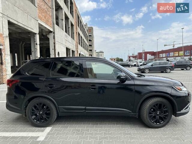 Чорний Міцубісі Аутлендер, об'ємом двигуна 2.4 л та пробігом 81 тис. км за 17100 $, фото 3 на Automoto.ua