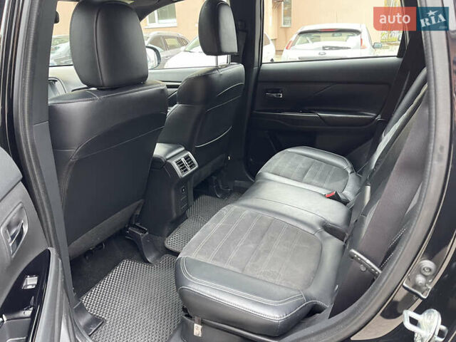 Чорний Міцубісі Аутлендер, об'ємом двигуна 2.36 л та пробігом 153 тис. км за 16450 $, фото 11 на Automoto.ua