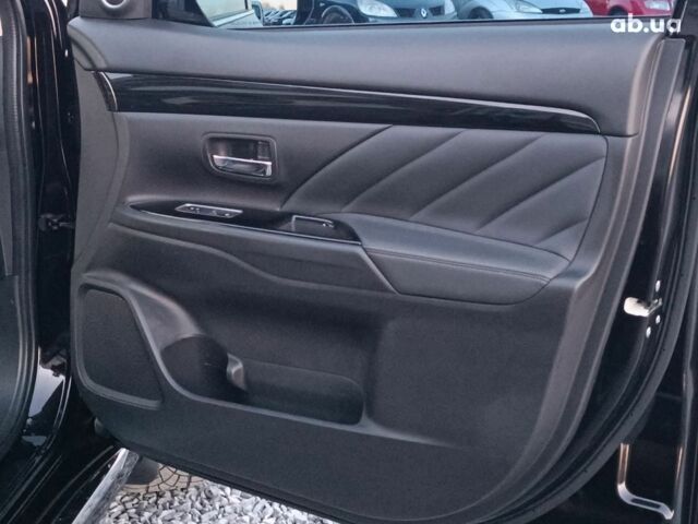 Черный Мицубиси Аутлендер, объемом двигателя 2 л и пробегом 115 тыс. км за 23700 $, фото 31 на Automoto.ua