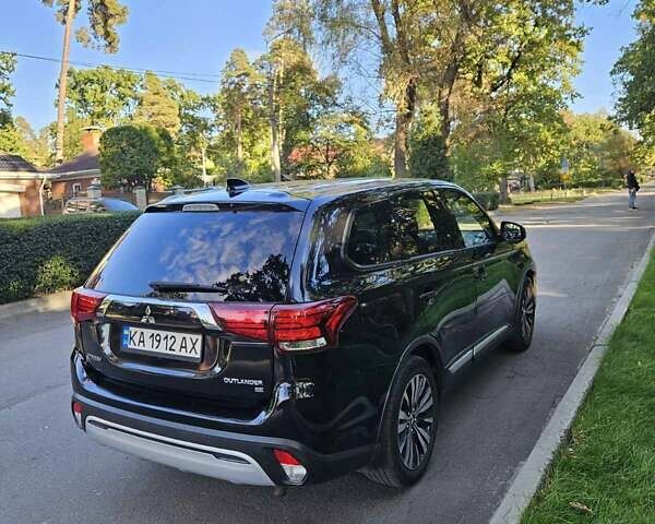 Чорний Міцубісі Аутлендер, об'ємом двигуна 2.36 л та пробігом 91 тис. км за 16400 $, фото 5 на Automoto.ua