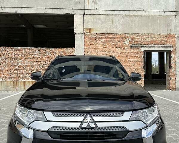 Чорний Міцубісі Аутлендер, об'ємом двигуна 2.4 л та пробігом 81 тис. км за 17100 $, фото 6 на Automoto.ua