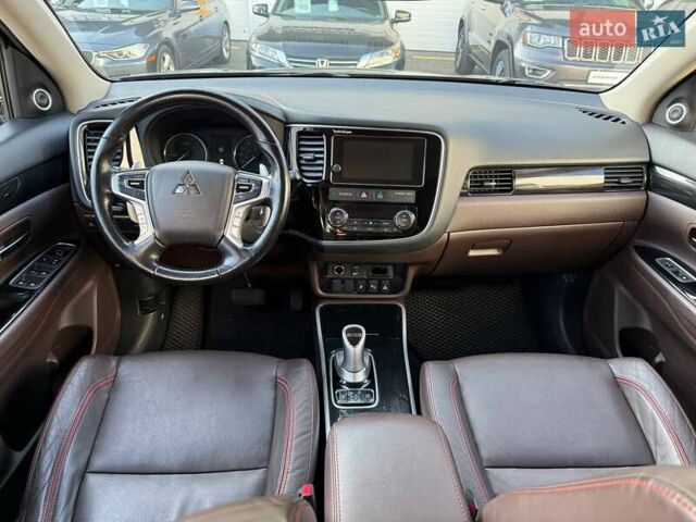 Черный Мицубиси Аутлендер, объемом двигателя 2 л и пробегом 67 тыс. км за 23000 $, фото 25 на Automoto.ua