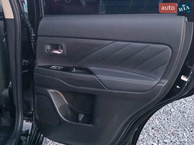 Чорний Міцубісі Аутлендер, об'ємом двигуна 2 л та пробігом 115 тис. км за 23700 $, фото 33 на Automoto.ua