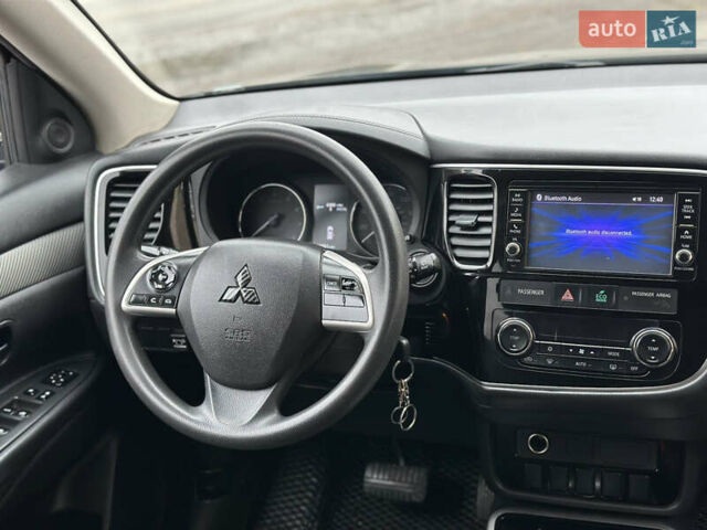 Чорний Міцубісі Аутлендер, об'ємом двигуна 2.36 л та пробігом 169 тис. км за 13450 $, фото 25 на Automoto.ua
