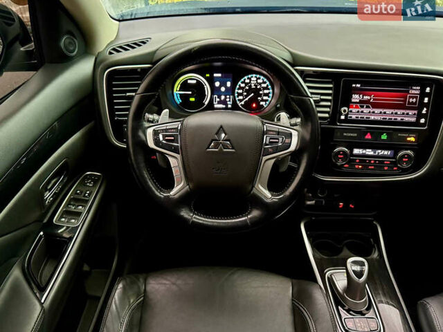 Чорний Міцубісі Аутлендер, об'ємом двигуна 2 л та пробігом 79 тис. км за 22900 $, фото 37 на Automoto.ua