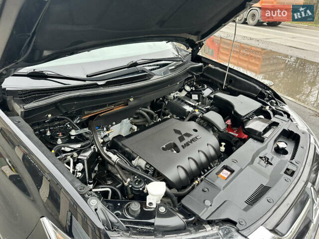 Чорний Міцубісі Аутлендер, об'ємом двигуна 2.36 л та пробігом 169 тис. км за 13450 $, фото 32 на Automoto.ua