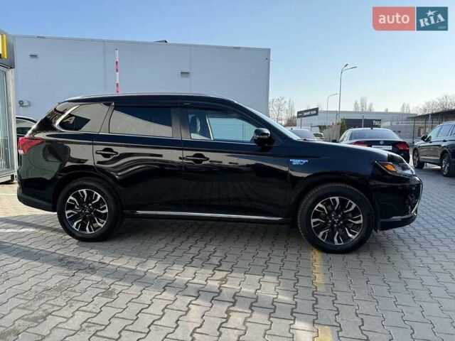 Черный Мицубиси Аутлендер, объемом двигателя 2 л и пробегом 67 тыс. км за 23000 $, фото 5 на Automoto.ua