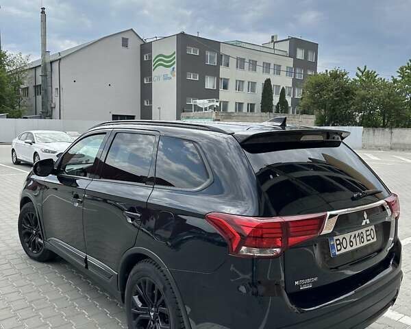 Чорний Міцубісі Аутлендер, об'ємом двигуна 2.4 л та пробігом 81 тис. км за 17100 $, фото 10 на Automoto.ua