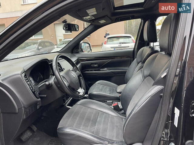 Чорний Міцубісі Аутлендер, об'ємом двигуна 2.36 л та пробігом 153 тис. км за 16450 $, фото 12 на Automoto.ua