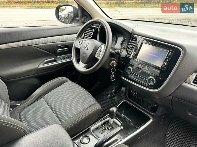 Чорний Міцубісі Аутлендер, об'ємом двигуна 2.36 л та пробігом 169 тис. км за 13450 $, фото 29 на Automoto.ua