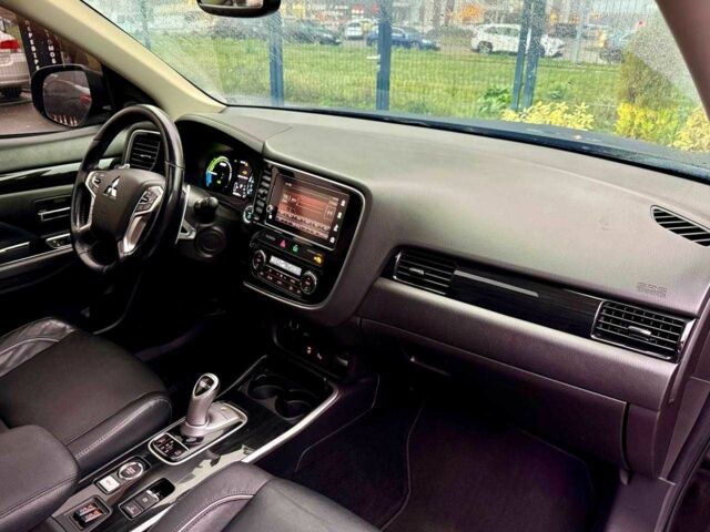 Чорний Міцубісі Аутлендер, об'ємом двигуна 2 л та пробігом 79 тис. км за 22900 $, фото 22 на Automoto.ua