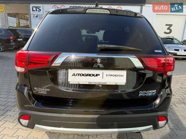 Черный Мицубиси Аутлендер, объемом двигателя 2 л и пробегом 67 тыс. км за 23000 $, фото 3 на Automoto.ua