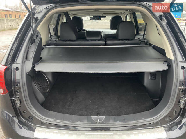 Черный Мицубиси Аутлендер, объемом двигателя 2 л и пробегом 76 тыс. км за 20800 $, фото 14 на Automoto.ua