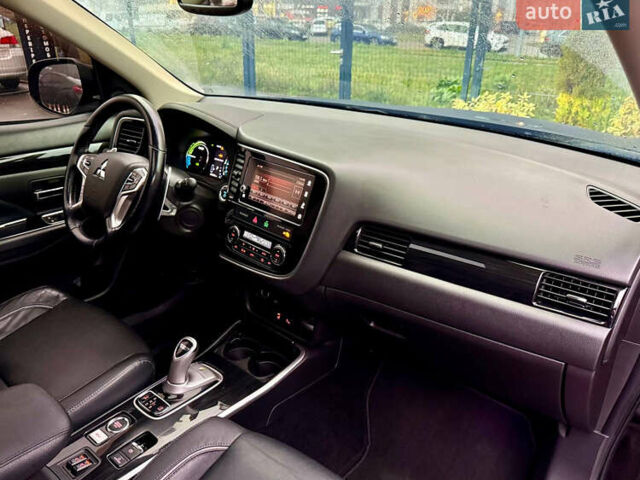 Чорний Міцубісі Аутлендер, об'ємом двигуна 2 л та пробігом 79 тис. км за 22900 $, фото 42 на Automoto.ua